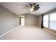 Large bedroom with ceiling fan and neutral-colored walls at 11890 Pine Meadow Cir, Fishers, IN 46037