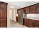 Stainless steel refrigerator and ample kitchen cabinetry at 16907 Maple Springs Way, Westfield, IN 46074