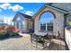 Stone and shingle home with patio and firepit at 16907 Maple Springs Way, Westfield, IN 46074