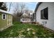 Backyard with shed and deck, lightly snowed at 175 Christy Dr, Greenwood, IN 46143