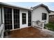 Back deck with access from sunroom, freshly snowed at 175 Christy Dr, Greenwood, IN 46143