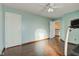 Well-lit bedroom with hardwood floors, showing access to another room at 2612 Kirk Ct, Lebanon, IN 46052