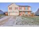 Two-story house with solar panels, brick accents, and a landscaped lawn at 2612 Kirk Ct, Lebanon, IN 46052