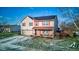 Two-story house with solar panels and attached garage at 2612 Kirk Ct, Lebanon, IN 46052