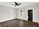 Living room with hardwood floors, neutral walls, and a ceiling fan at 28 N Denny St, Indianapolis, IN 46201