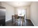 Dining room features a light gray table with four chairs at 2894 Maricopa Blvd, Whitestown, IN 46075