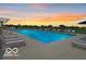 Community pool with lounge chairs and sunset view at 2894 Maricopa Blvd, Whitestown, IN 46075