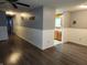 Living room with hardwood floors and kitchen view at 2949 Shriver Ave, Indianapolis, IN 46208