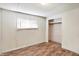 Small bedroom with wood-look floors, closet, and window at 33 Miami Dr, Noblesville, IN 46062