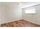 Simple bedroom with wood-look floors and neutral walls at 33 Miami Dr, Noblesville, IN 46062
