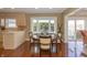 Bright dining area with bay window and hardwood floors at 3424 Bay Rd S Dr, Indianapolis, IN 46240