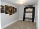 Bedroom with grey walls, carpeting, and window coverings at 443 N Centennial St, Indianapolis, IN 46222