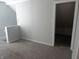 Spacious bedroom with neutral walls, carpet, and ample closet space at 443 N Centennial St, Indianapolis, IN 46222