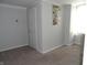 Simple bedroom with neutral walls, carpet, and closet at 443 N Centennial St, Indianapolis, IN 46222