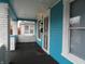 Covered porch with security door and window at 443 N Centennial St, Indianapolis, IN 46222
