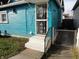 Side entrance with security door and steps at 443 N Centennial St, Indianapolis, IN 46222