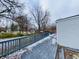 Wooden deck with gray railings, offering a view of the backyard at 658 Brushwood Way, Greenwood, IN 46142