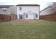 Large backyard with grassy area and home view at 7144 Kimble Dr, Indianapolis, IN 46217