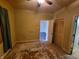 Empty bedroom with hardwood floors and ceiling fan at 937 N Olney St, Indianapolis, IN 46201