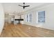 Spacious living area with hardwood floors and large windows at 1018 Calvary St, Indianapolis, IN 46203