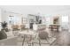 Open-concept living and dining area next to a modern kitchen at 1230 N Alabama St, Indianapolis, IN 46202