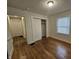 Bright bedroom with hardwood floors and spacious closet at 1324 N Gale St, Indianapolis, IN 46201