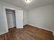 Simple bedroom with hardwood floors and closet at 1324 N Gale St, Indianapolis, IN 46201