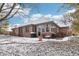 Brick house exterior with snow covered yard at 142 E Banta Rd, Indianapolis, IN 46227