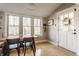 Bright breakfast nook with built-in bench seating and a rustic table at 2264 Moon Shadow Ln, Indianapolis, IN 46280