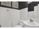 Simple bathroom with white subway tiles, a pedestal sink and a toilet at 3638 Planck Cir, Danville, IN 46122