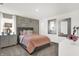 Stylish bedroom with gray walls and pink bedding at 3638 Planck Cir, Danville, IN 46122