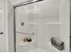 Walk-in shower with glass enclosure and built-in seat at 3703 Sunset Ridge Dr, Franklin, IN 46131