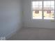 Bright bedroom featuring large windows and new flooring at 3912 Highcrest Rd, Indianapolis, IN 46239