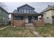 Charming two-story home with brick accents and a covered porch at 424 N Kealing Ave, Indianapolis, IN 46201