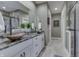 Elegant bathroom featuring a double vanity and a large mirror at 4314 Lantern Rd, Martinsville, IN 46151