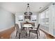 Bright dining room featuring a glass table and chandelier at 5670 Gainesway Dr, Greenwood, IN 46142