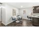 Modern dining area with a round table, four chairs and hardwood floors at 7421 Frederick E Dr, Indianapolis, IN 46260