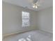 Simple bedroom with carpet flooring and a ceiling fan at 7455 Oak Knoll Dr, Indianapolis, IN 46217