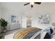 Bedroom with carpet, ceiling fan and stylish decor at 7548 Crickwood Ln, Indianapolis, IN 46268