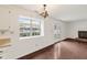 Cozy dining area with hardwood floors and access to backyard at 7548 Crickwood Ln, Indianapolis, IN 46268