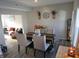 Elegant dining room with a rustic wood table and seating for four at 10538 Rose Mill Dr, Lawrence, IN 46235