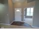 Bright entryway with wood-look flooring and access to other rooms at 1061 Belgium Blvd, Bargersville, IN 46106