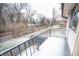 Private backyard with snowy ground and wooden fence at 1068 Greenwood Trail W W Dr, Greenwood, IN 46142