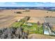 Aerial view of house, barns, and surrounding farmlands at 11262 N Everett Rd, Monrovia, IN 46157