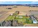 Aerial view of house, property, and surrounding farmland at 11262 N Everett Rd, Monrovia, IN 46157
