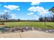 Large backyard with grassy area and stone patio at 11262 N Everett Rd, Monrovia, IN 46157