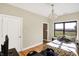 Bedroom with a bed, wood floors, and a view of the backyard at 11262 N Everett Rd, Monrovia, IN 46157
