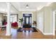 Elegant entryway with hardwood floors, a statement door, and a tile entry at 11262 N Everett Rd, Monrovia, IN 46157