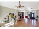Bright entryway with hardwood floors, an ornate chair, and views into the living areas at 11262 N Everett Rd, Monrovia, IN 46157