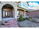 Brick front porch with stone accents and landscaping at 11262 N Everett Rd, Monrovia, IN 46157